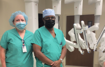 Janelle Skjervem, Director of Perioperative Services, and Dr. Francis A. Essien, General and Robotic Surgery, welcome the arrival of the da Vinci Xi Surgical System